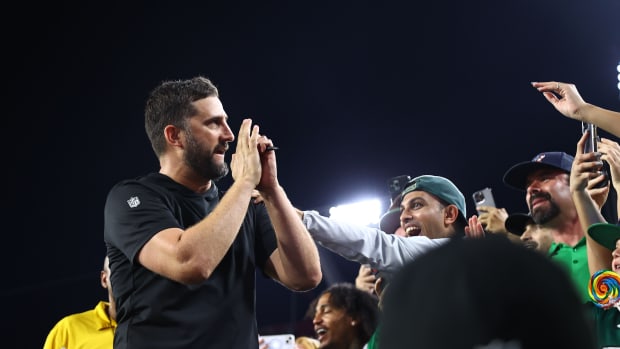 Philadelphia Eagles head coach Nick Sirianni celebrates with the fans.
